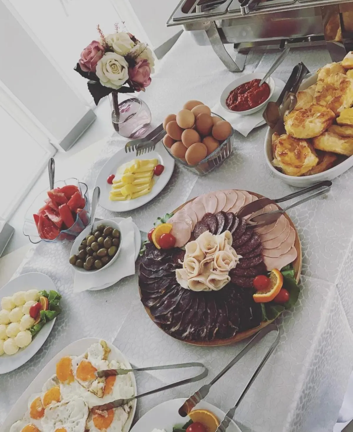 Breakfast dishes prepared for guests