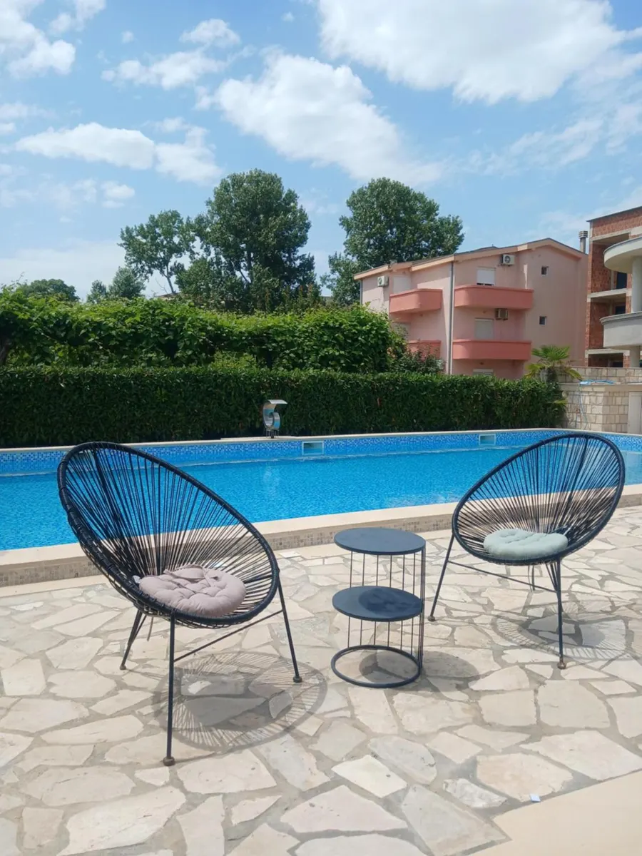 Sun loungers beside the pool