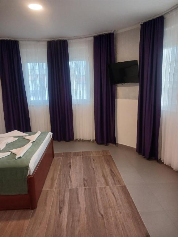 Guest room with a wall mounted television
